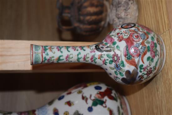 A 19th century Chinese famille rose basin, two jars and covers and a vase diameter 38cm